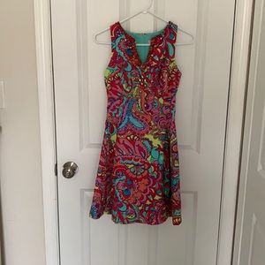 Lilly Pulitzer brightly colored dress.